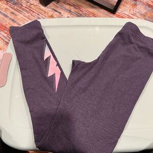 Girl’s Old Navy Built-In Tough leggings with lightning strike appliqué on leg